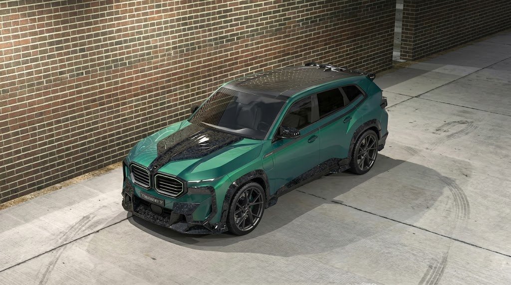 Luxury SUV equipped with a premium Mansory widebody kit featuring custom forged carbon fiber aerodynamic components.